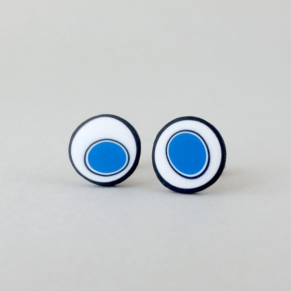 Handmade stud earrings with organic circles of cobalt blue on a white background with a black border.