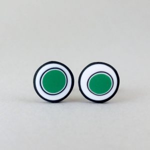 Handmade stud earrings with organic circles of emerald green on a white background with a black border.