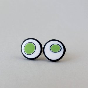 Handmade stud earrings with organic circles of lime green on a white background with a black border.