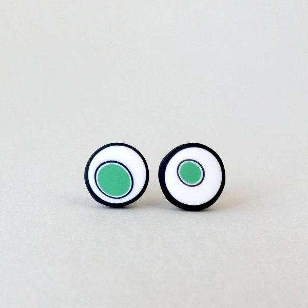 Handmade stud earrings with organic circles of mint green on a white background with a black border.