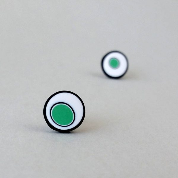 Handmade stud earrings with organic circles of mint green on a white background with a black border.