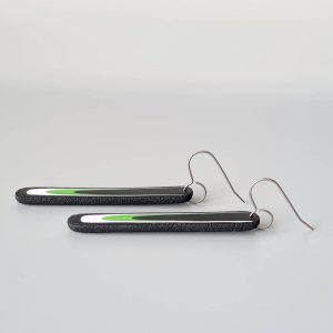 Handmade long dangle earrings with a clean, modern pattern in black, lime green and white. Hand crafted titanium earwires.