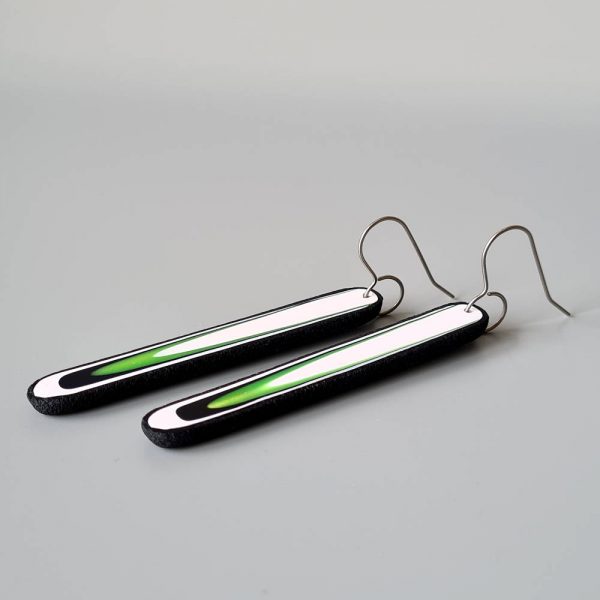 Handmade long dangle earrings with a clean, modern pattern in black, lime green and white. Hand crafted titanium earwires.