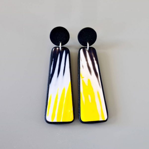 Handmade dangle earrings with zigzag pattern in black, white and sunshine yellow.