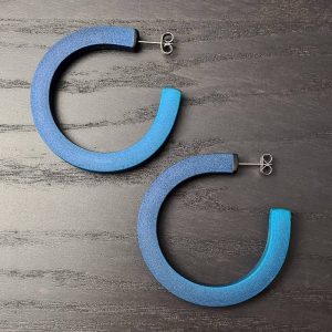 Handmade meduim-sized hoop earrings in shimmering deep teal with ombre effect. Titanium posts.